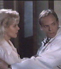 Twists of Terror -  Dr.Roberts  instructs Tanya to quickly find and subdue a distaught  Mr. Rosetti 